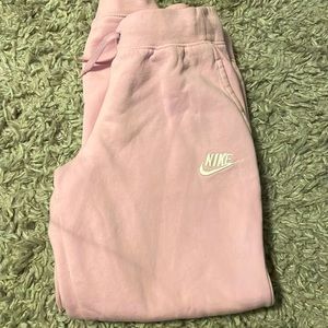 Pink nike sweatpants youth size xl, fits a womens small